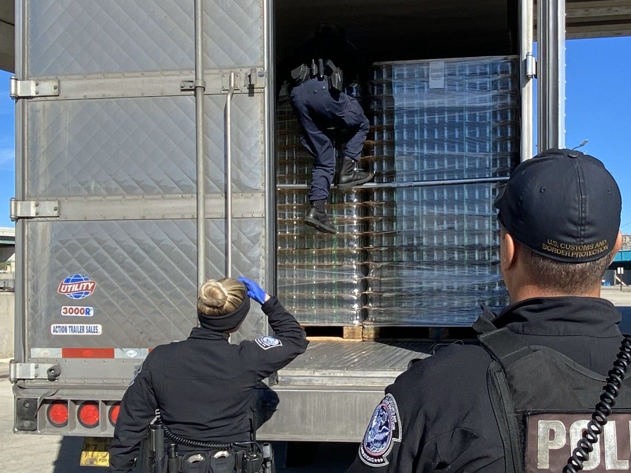  U.S. Customs and Border Protection officers founder over half a ton of cocaine in the back of this truck at the Detroit-Windsor border crossing on Thursday.