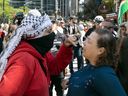 A Hamas supporter argues with a supporter of Israel outside Roy Thomson Hall, where the documentary film “The Road Between Us:The Ultimate Rescue” was being viewed at the Toronto film festival on Wednesday, September 10, 2025.
