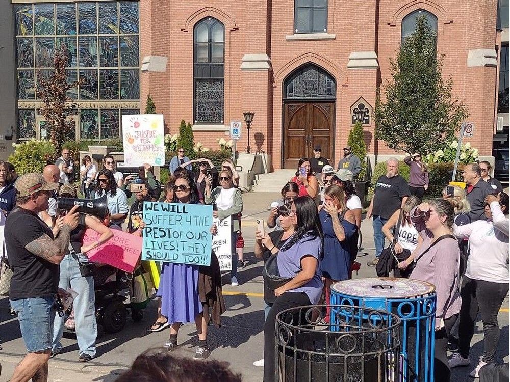  People protest in St. Catharines outside the courthouse hearing the case of Daniel Senecal, who is charged with the alleged sexual assault of a three-year-old girl in an Aug. 31 incident in Welland.