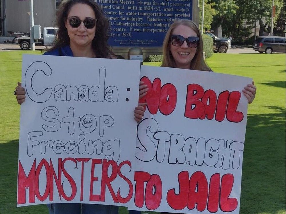  People protest in St. Catharines outside the courthouse hearing the case of Daniel Senecal, who is charged with the alleged sexual assault of a three-year-old girl in an Aug. 31 incident in Welland.