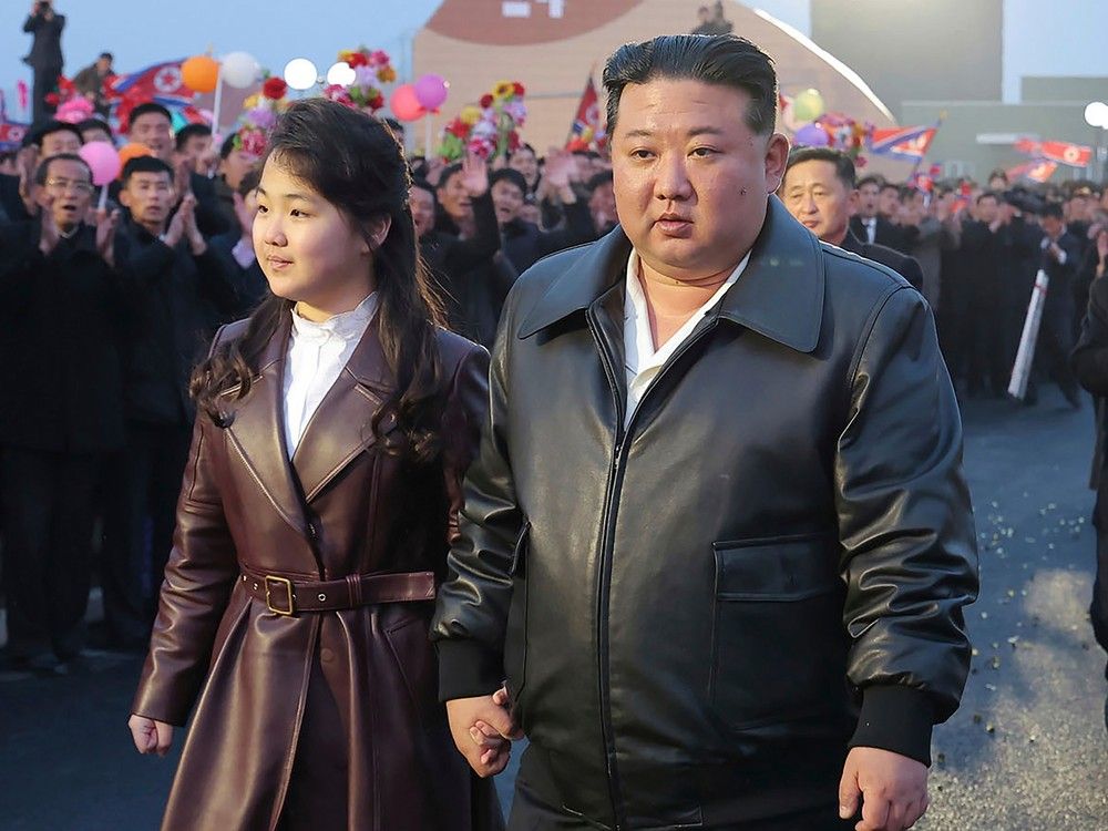  In this photo provided by the North Korean government, North Korean leader Kim Jong Un, center right, and his daughter attend a completion and operation ceremony of Kangdong Greenhouse Farm in Pyongyang, North Korea, March 15, 2024.