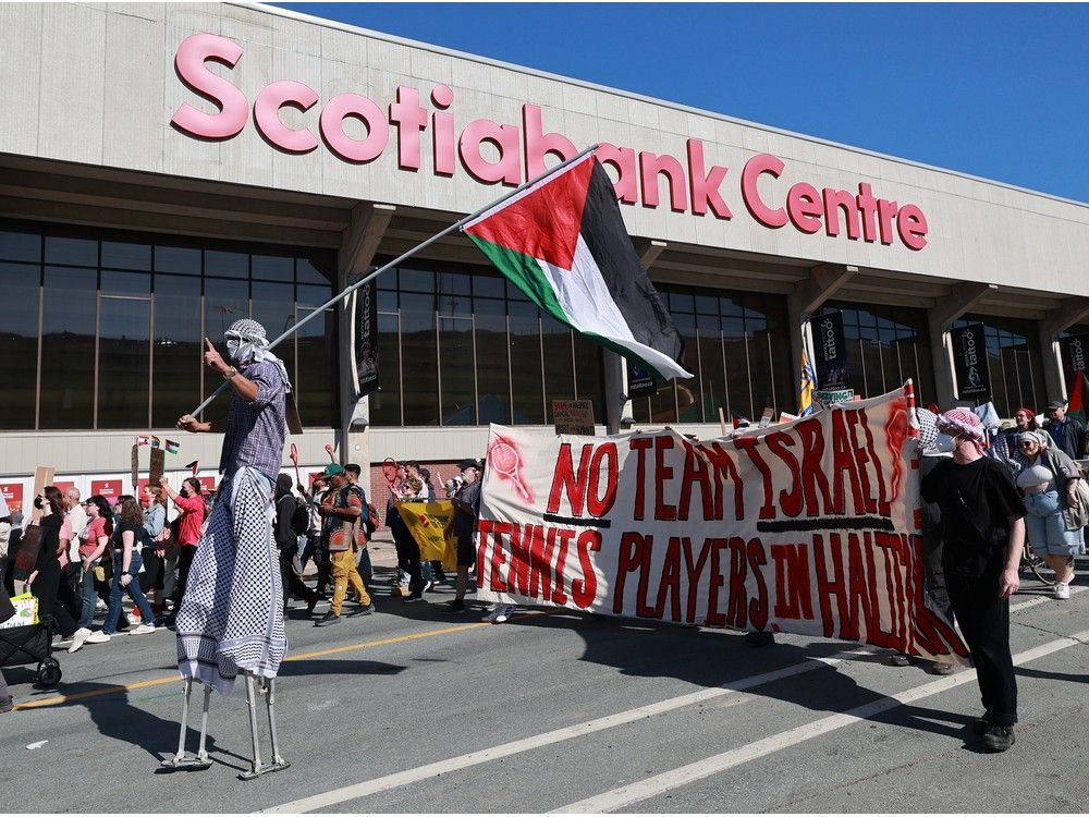 Pro-Palestinian demonstrators march along Brunswick Street in front of Scotiabank Centre protesting the Davis Cup tennis matches between Canada and Israel at the downtown arena. Pro-Palestinian demonstrators march along Brunswick Street in front of Scotiabank Centre protesting the Davis Cup tennis matches between Canada and Israel at the downtown arena.