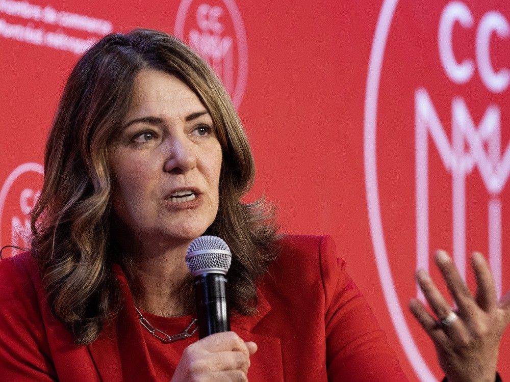 NextImg:Danielle Smith says she's giving Carney until Grey Cup to fix nine 'bad laws'
