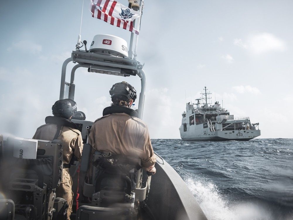 HMCS William Hall conducts a boat transfer of seized narcotics to the USS Cole as the two ships sail in consort while supporting counter-narcotics patrols in the Caribbean Sea during Operation CARIBBE on June 9, 2025. HMCS William Hall conducts a boat transfer of seized narcotics to the USS Cole as the two ships sail in consort while supporting counter-narcotics patrols in the Caribbean Sea during Operation CARIBBE on June 9, 2025.