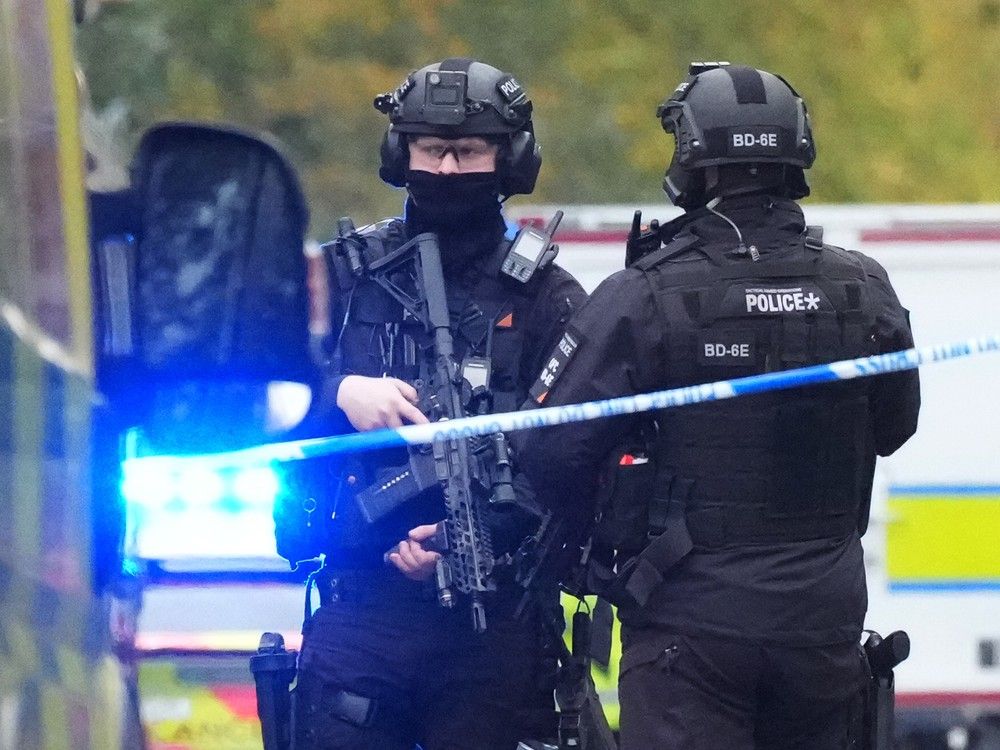 Armed Police and emergency responders gather near the Heaton Park Hebrew Congregation Synagogue, where multiple were injured after stabbing and car attack on Yom Kippur, on October 2, 2025 in the Crumpsall suburb of Manchester, England. Armed Police and emergency responders gather near the Heaton Park Hebrew Congregation Synagogue, where multiple were injured after stabbing and car attack on Yom Kippur, on October 2, 2025 in the Crumpsall suburb of Manchester, England.