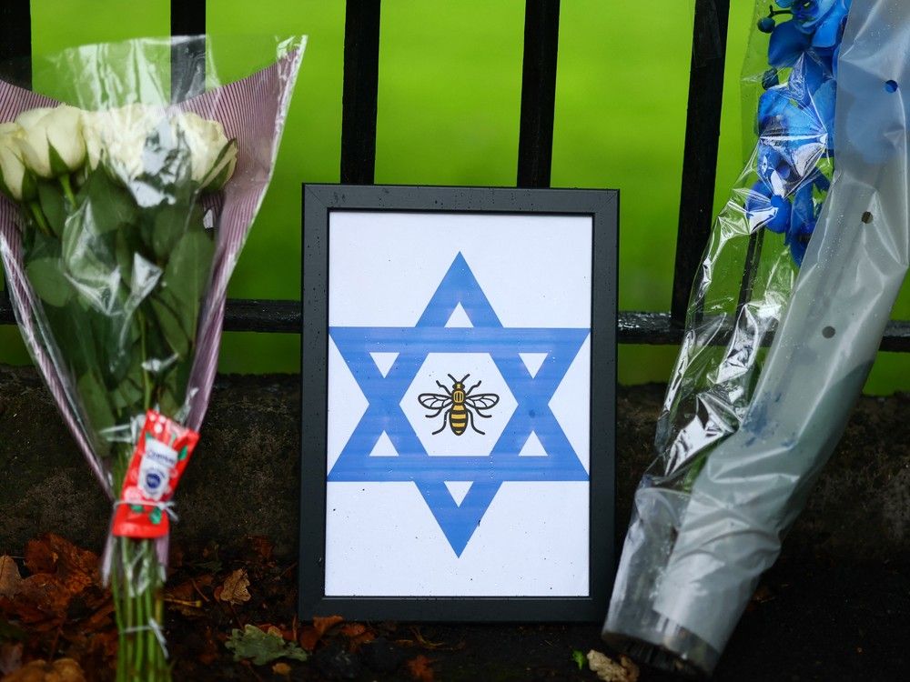 Flowers and tributes are pictured on the main road outside Heaton Park Hebrew Congregation synagogue in Crumpsall, north Manchester, on October 3, 2025, following an attack at the synagogue the day before. Flowers and tributes are pictured on the main road outside Heaton Park Hebrew Congregation synagogue in Crumpsall, north Manchester, on October 3, 2025, following an attack at the synagogue the day before.