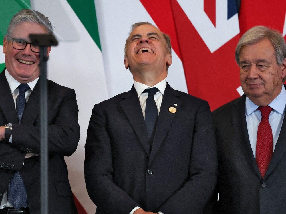 (LtoR) British Prime Minister Keir Starmer, Canadian Prime Minister Mark Carney and United Nations (UN) Secretary-General Antonio Guterres share a laugh at the end of the Gaza summit in Sharm El-Sheikh on October 13, 2025. (LtoR) British Prime Minister Keir Starmer, Canadian Prime Minister Mark Carney and United Nations (UN) Secretary-General Antonio Guterres share a laugh at the end of the Gaza summit in Sharm El-Sheikh on October 13, 2025.