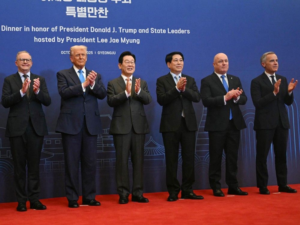  (L-R) Australia’s Prime Minister Anthony Albanese, US President Donald Trump, South Korea’s President Lee Jae Myung, Vietnam’s President Luong Cuong, New Zealand’s Prime Minister Christopher Luxon, and Canada’s Prime Minister Mark Carney pose for a family photo upon their arrival for a special dinner hosted in honour of US President Donald Trump and state leaders at the Hilton Gyeongju hotel in Gyeongju on October 29, 2025.