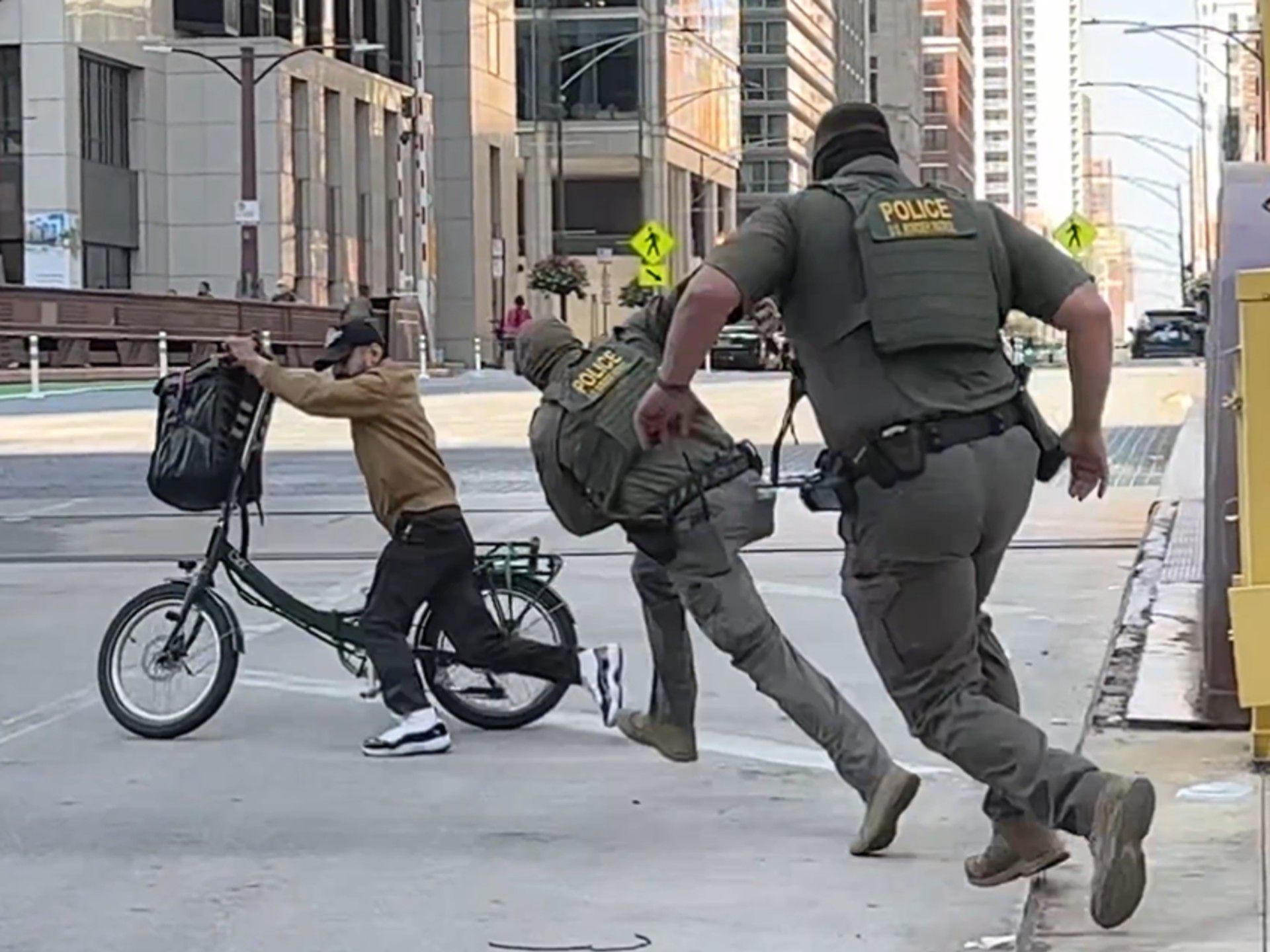 NextImg:'I am not a U.S. citizen': Video shows border agents chasing cyclist after being provoked repeatedly