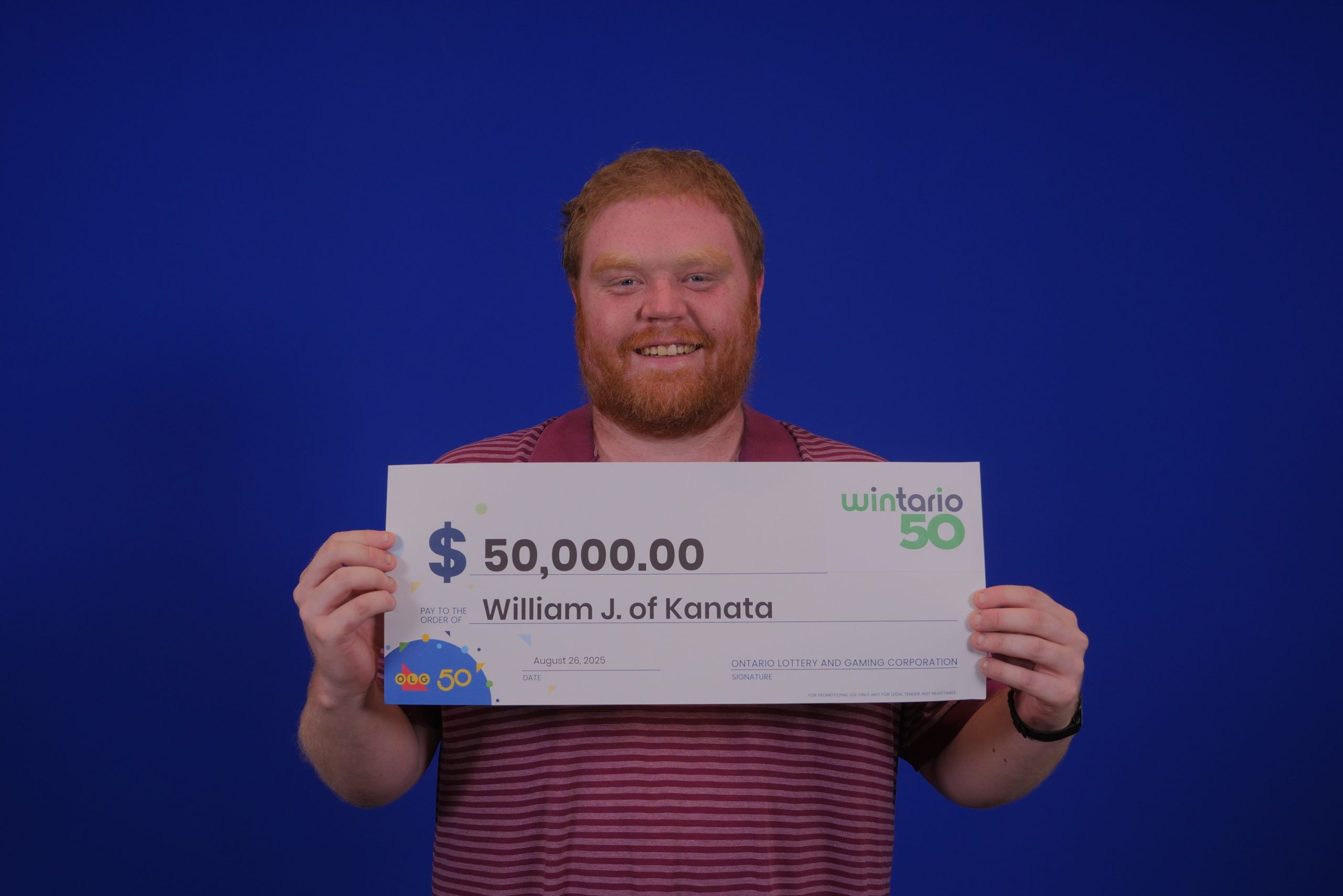 William with his winning cheque