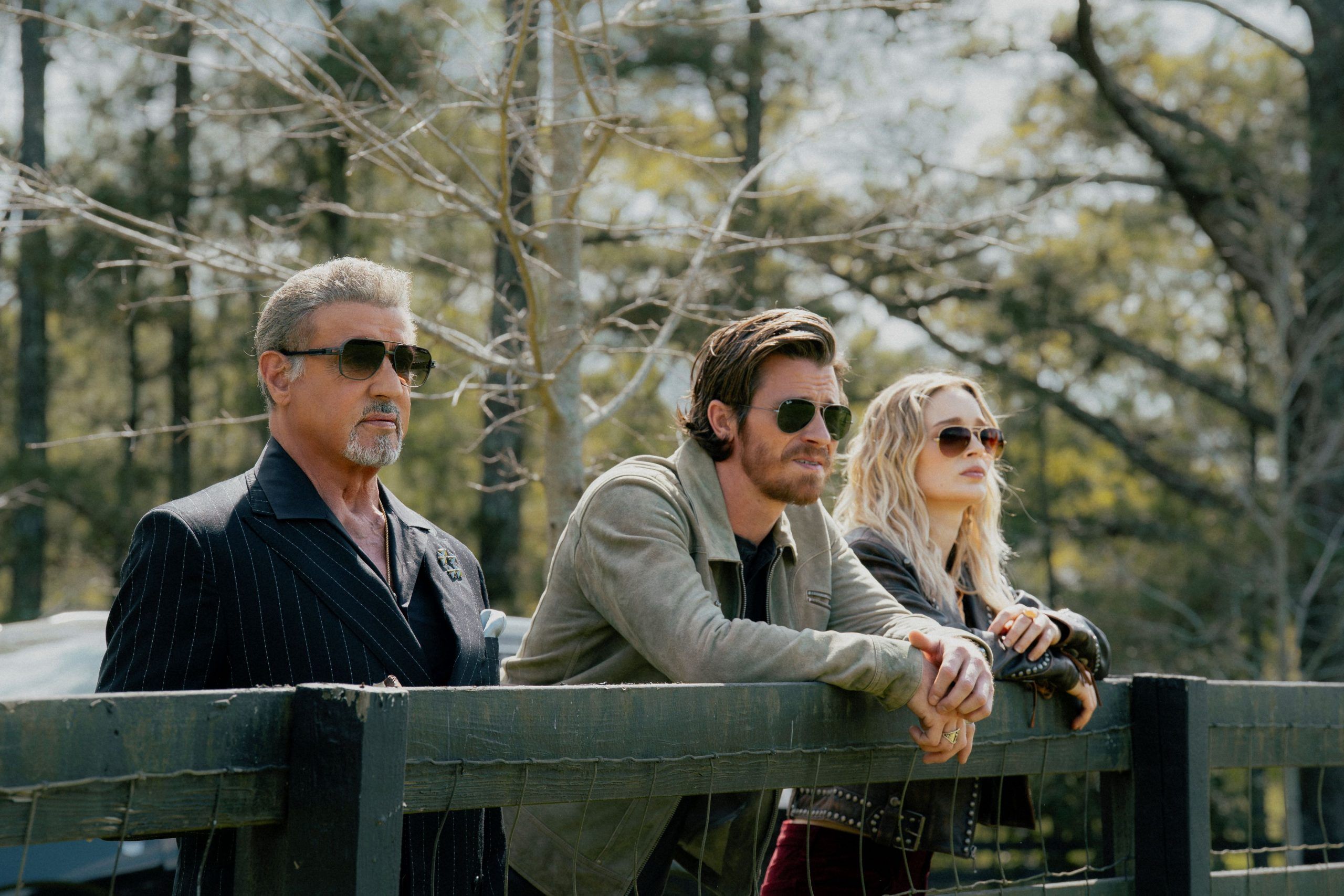  Sylvester Stallone as shady mobster Dwight Manfredi, here with Garrett Hedlund as Mitch and Bella Heathcote as Cleo, will return in a fourth season of the Paramount+ series Tulsa King. Brian Douglas/Paramount+