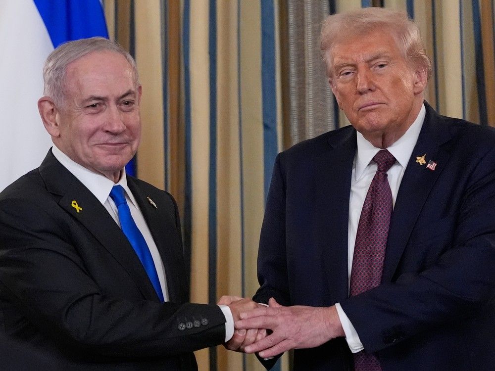 NextImg:Israel to implement first phase of Trump plan to end Hamas war
