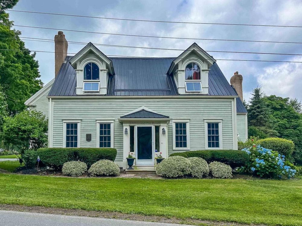  The front of the house shows its original look.