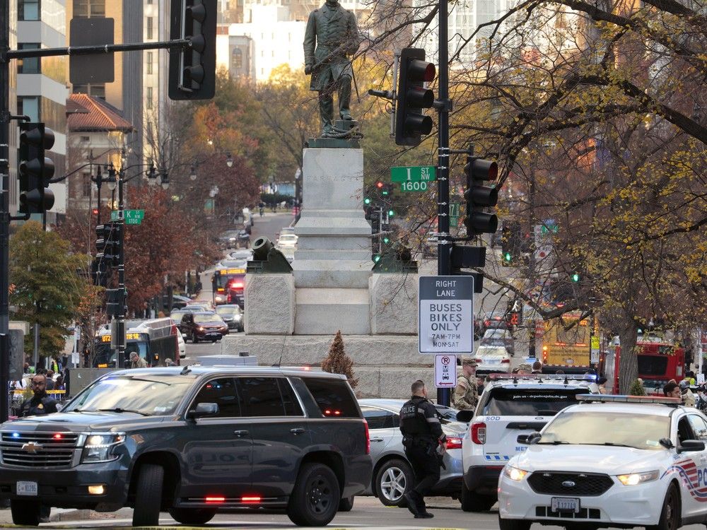  Members of law enforcement, including the U.S. Secret Service and the Washington Metropolitan Police Department, respond to a shooting near the White House on Nov. 26, 2025 in Washington, DC.