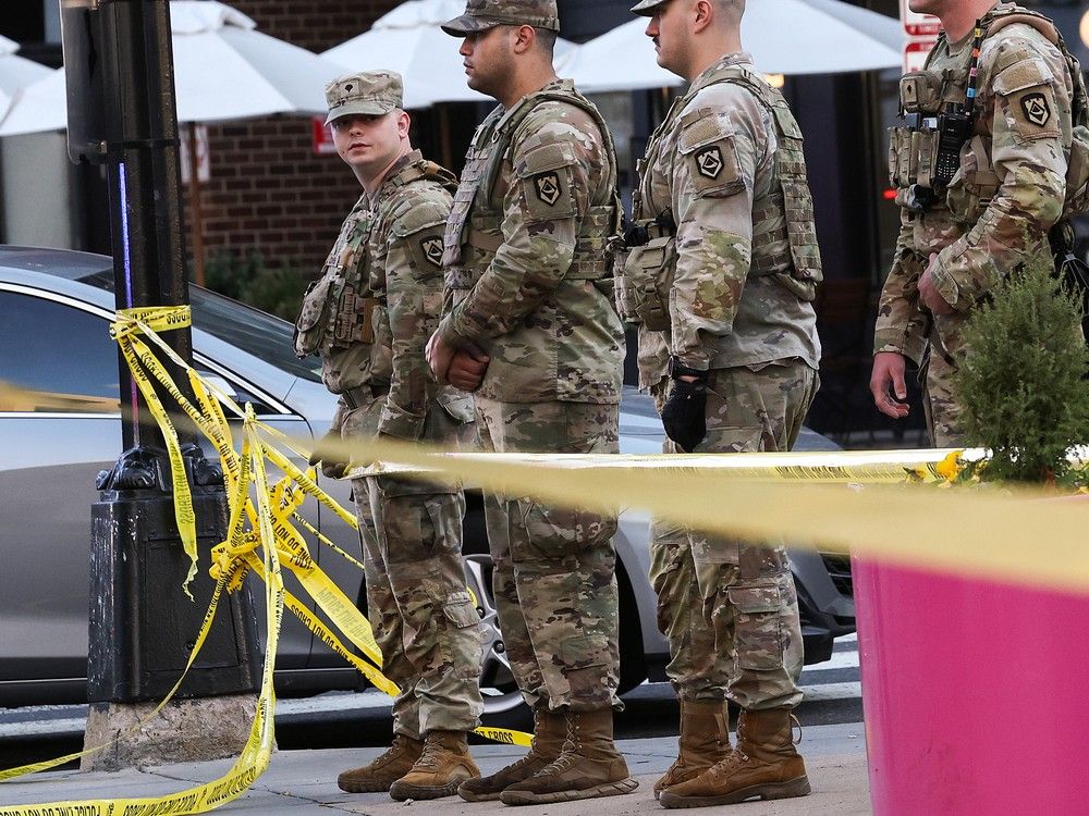  Members of National Guard respond to a shooting near the White House on Nov. 26, 2025 in Washington, D.C.