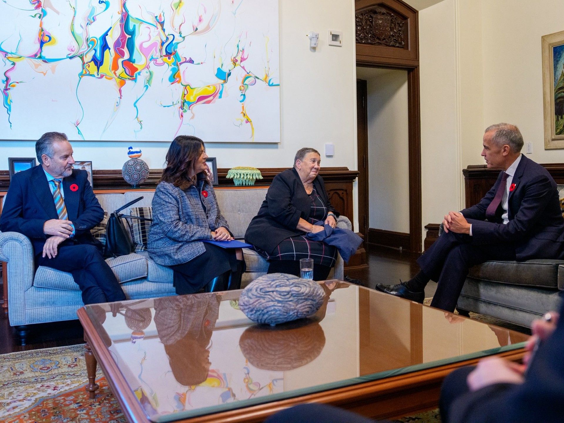 From the left, Alain Haim and Raquel Look, the mother and father of Alexandre Look, a 33-year-old Montrealer killed by Hamas terrorists while defending others at the Nova music festival, and Jacqui Rivers-Vital, the mother of Adi Vital-Kaploun, a 33-year-old Canadian-Israeli murdered in her Israel home while protecting her two small sons, met with Prime Minister Mark Carney last week.