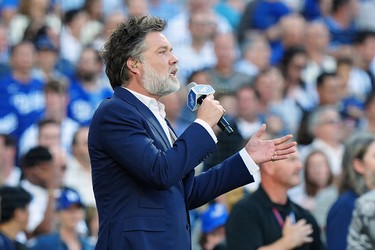 Rufus Wainwright sings O Canada before Game 5 of the World Series in Los Angeles on Oct. 29, 2025.