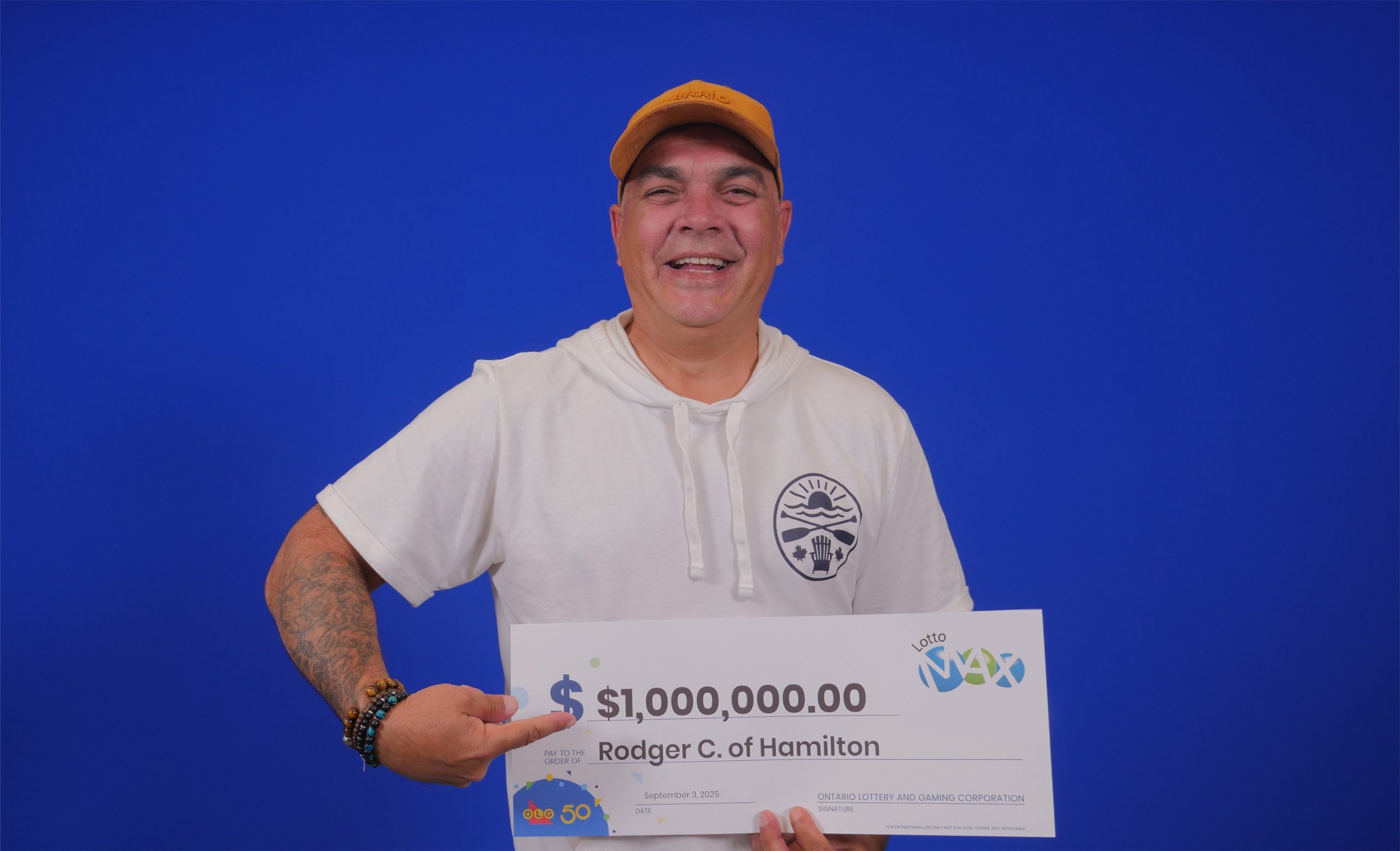 Rodger with his winning cheque