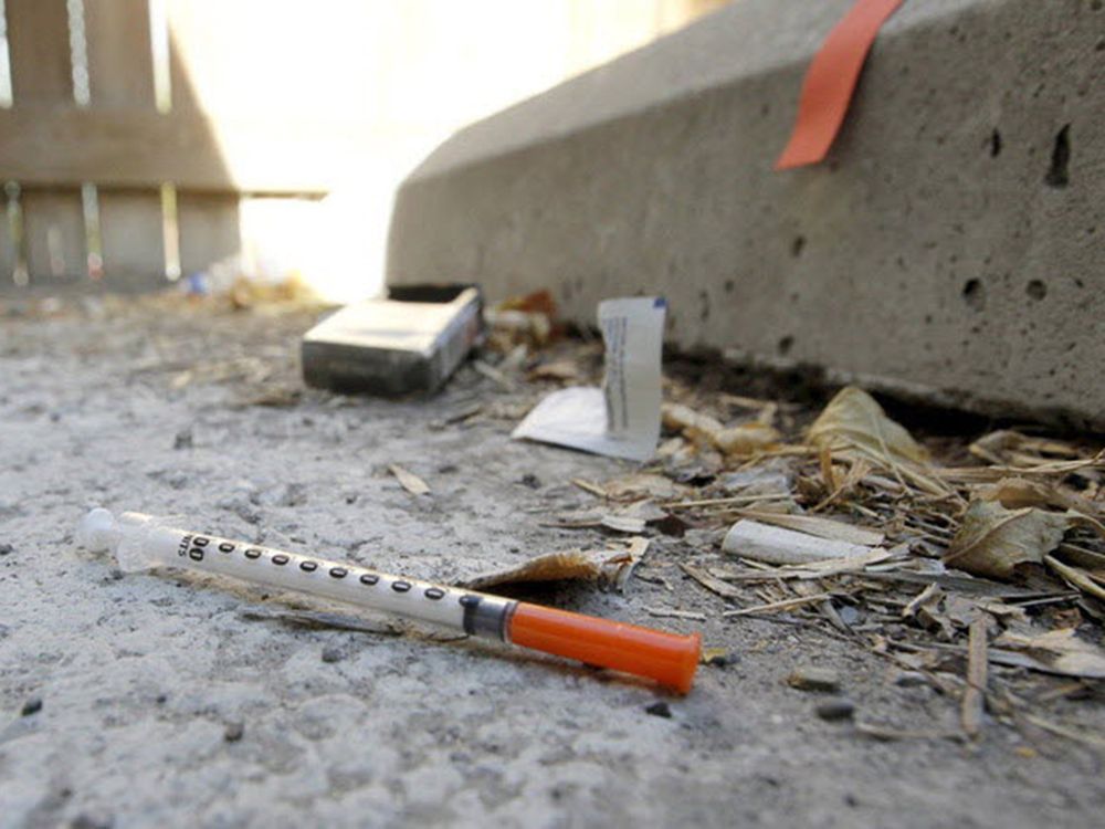  A discarded needle and drug paraphernalia on the ground in Timmins, Ont.