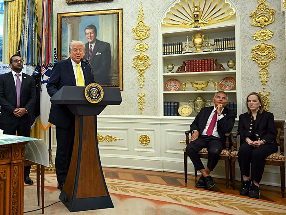  U.S. President Donald Trump speaks as FBI Director Kash Patel and former chairperson of Marvel Entertainment Isaac Perlmutter and his wife Laura listen during a press conference in the Oval Office of the White House, in Washington, D.C., on Oct. 15, 2025.