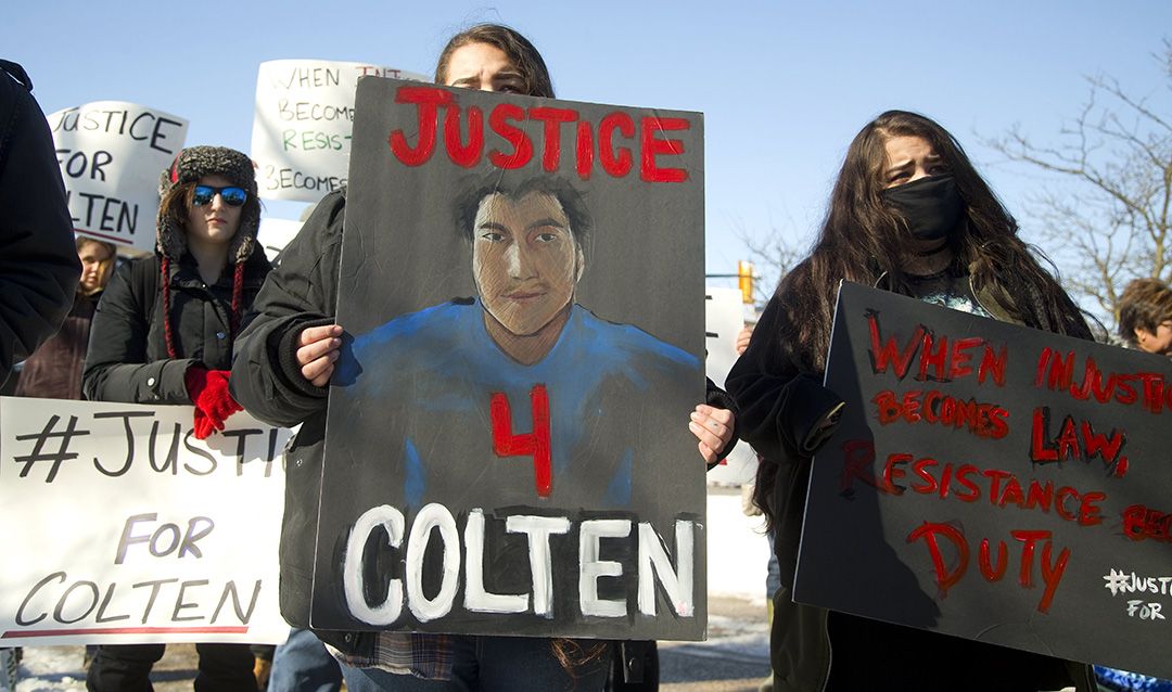 On Feb. 12, 2018, people protest in front of the courthouse in London, Ont., protest the verdict in the 2016 shooting death of Colten Boushie of Saskatchewan.