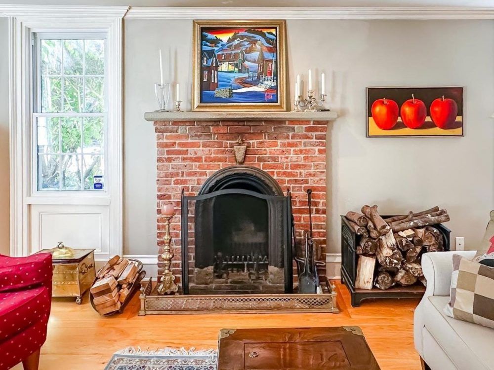  The original heritage wing includes a formal dining room and living room, while the 2004 addition includes a “great room” with a wood-burning fireplace, high ceilings and custom millwork.