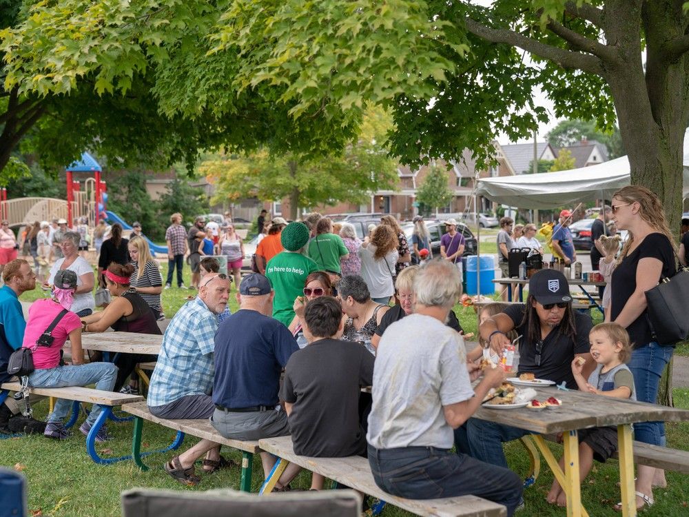 Neighbours gather for picnic in London, Ontario. From the perspective of age, trust in neighbours is stronger for people 35 or more, according to a new Leger poll for the Association for Canadian Studies. (MAX MARTIN, The London Free Press) Neighbours gather for picnic in London, Ontario. From the perspective of age, trust in neighbours is stronger for people 35 or more, according to a new Leger poll for the Association for Canadian Studies. (MAX MARTIN, The London Free Press)