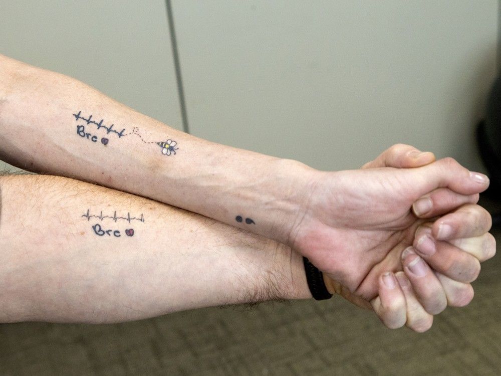  Brett and Jess Broadfoot have tattoos of their daughter Breanna’s heartbeat on their forearms.