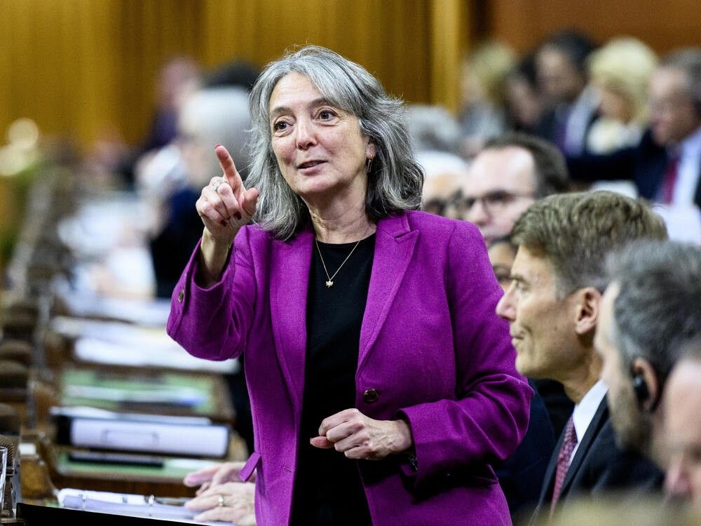 Minister of Environment and Climate Change Julie Dabrusin rises in the House of Commons during Question Period on Parliament Hill in Ottawa, on Thursday, Dec. 11, 2025.