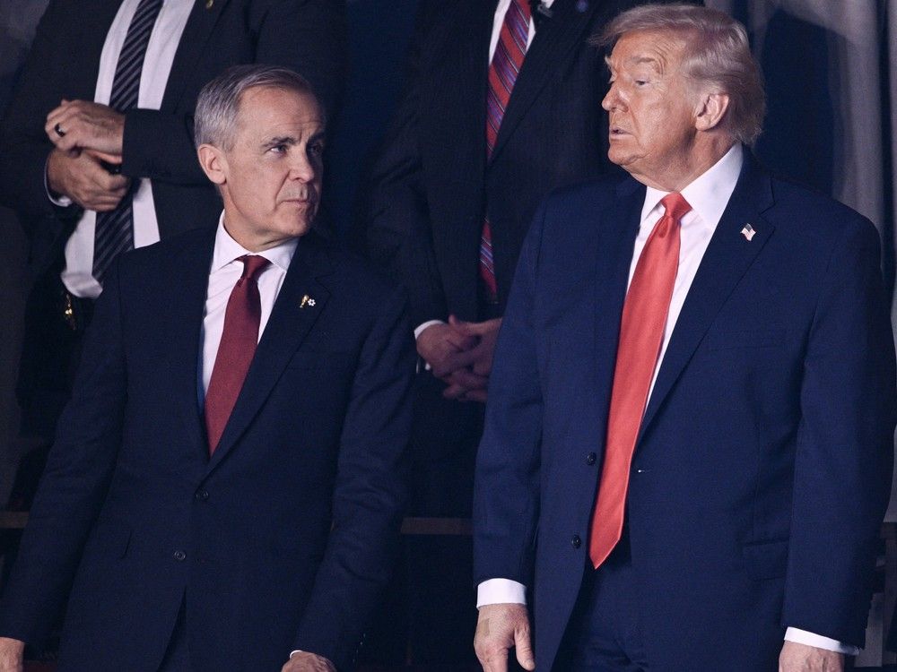 U.S. President Donald Trump, right, was non-committal when asked the possibility of resuming trade talks with Canada and Prime Minister Mark Carney, left. U.S. President Donald Trump, right, was non-committal when asked the possibility of resuming trade talks with Canada and Prime Minister Mark Carney, left.