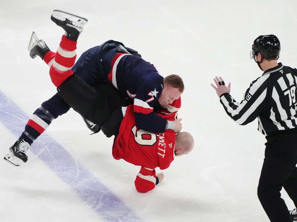 U.S. player Brady Tkachuk (top) fights Canada's Sam Bennett during first period 4 Nations Face-Off hockey action in Montreal on Feb. 15, 2025. U.S. player Brady Tkachuk (top) fights Canada's Sam Bennett during first period 4 Nations Face-Off hockey action in Montreal on Feb. 15, 2025.