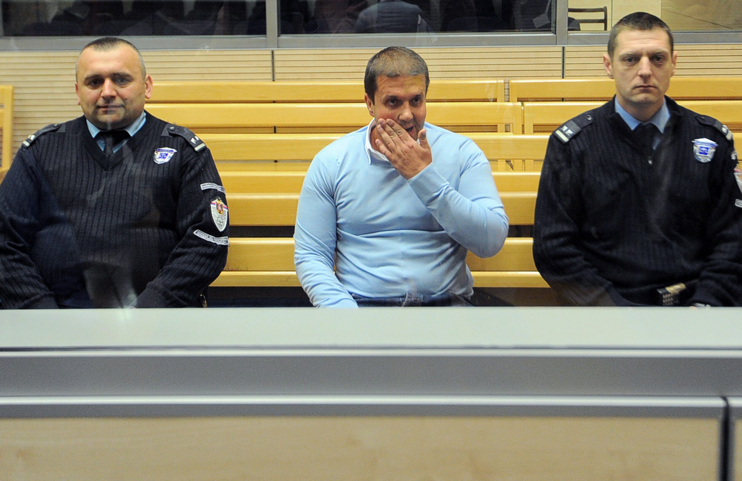 Darko Šarić (centre), on trial in Belgrade in 2014. Šarić is alleged to be the mastermind behind a cocaine trafficking network with links across Europe and South America. Darko Šarić (centre), on trial in Belgrade in 2014. Šarić is alleged to be the mastermind behind a cocaine trafficking network with links across Europe and South America.