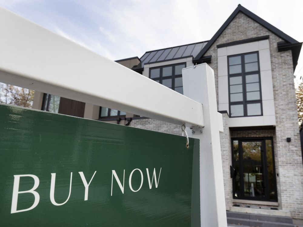 A home for sale with signage stating A home for sale with signage stating