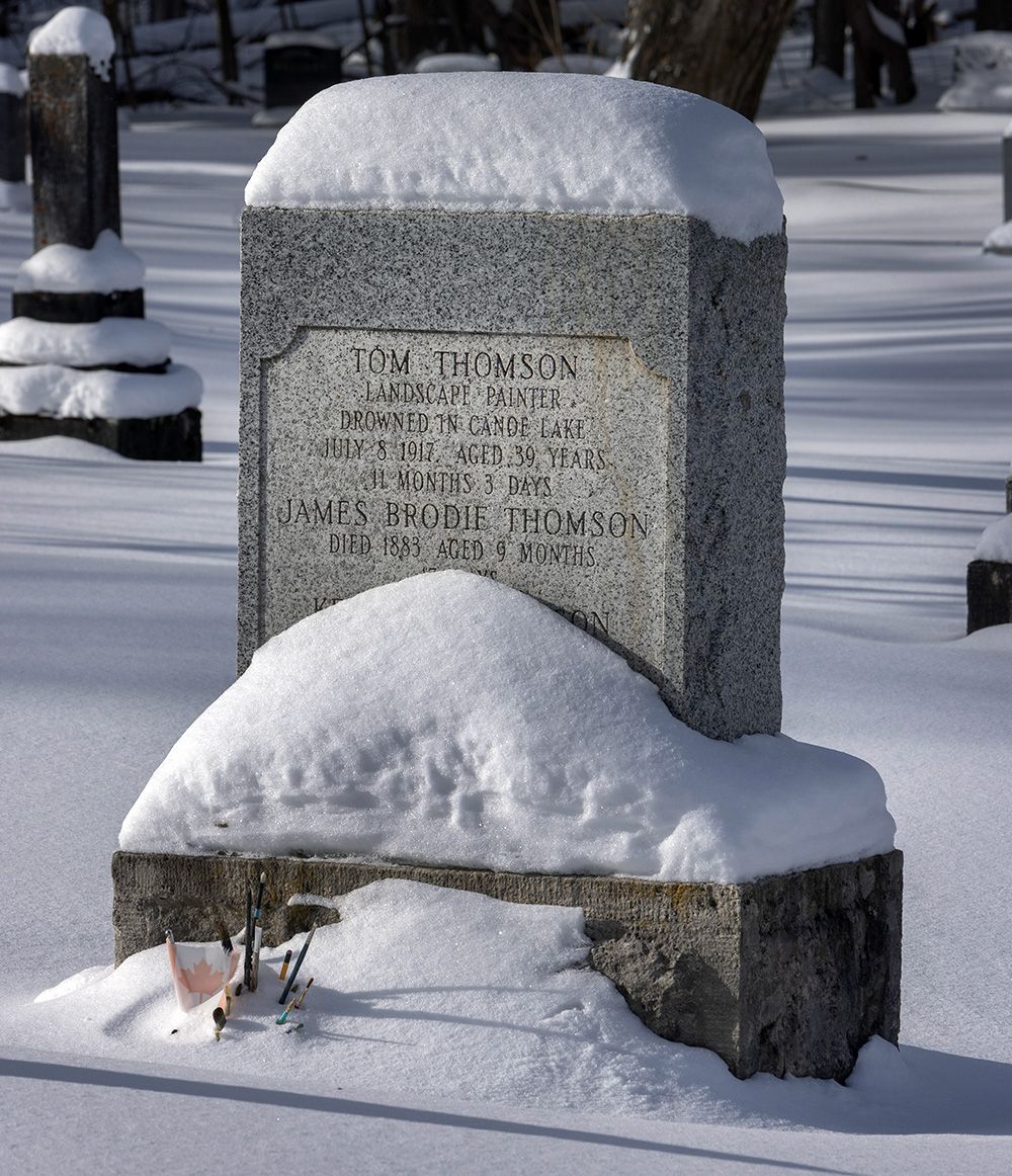  A cluster of paintbrushes bursts through the snow at artist Tom Thomson’s gravesite in Leith, Ont.