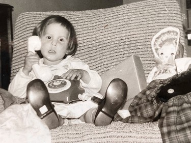 Valerie Fortney, 3, with a toy telephone.