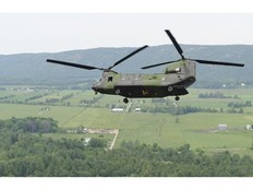 A CH-147F Chinook helicopter makes its way from the nation's capital up the Ottawa Valley to Canadian Forces Base Petawawa, Ont. - SUPPLIED BY CANADIAN ARMED FORCES