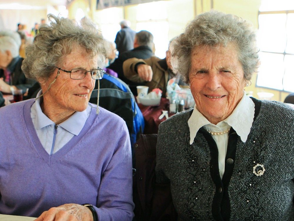  Rhona, left, and Rhoda Wurtele attend luncheon celebrating the 30th anniversary of seniors’ services program run by the City of Pointe Claire, west of Montreal Wednesday April 16, 2014.