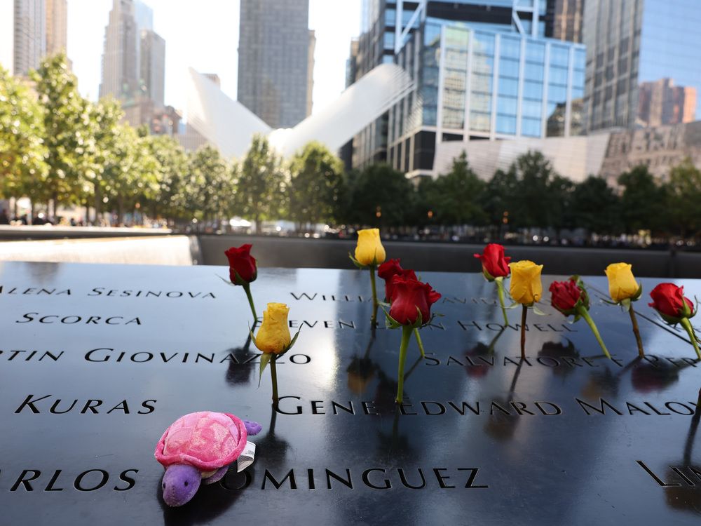 NEW YORK, NEW YORK - SEPTEMBER 11: Flowers are seen on names of victims of the  9/11 terror attack during the annual 9/11 Commemoration Ceremony at the National 9/11 Memorial and Museum on September 11, 2024 in New York City.  (Photo by Michael M. Santiago/Getty Images)