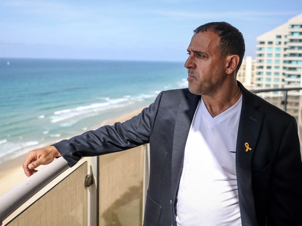  Eli Sharabi, an Israeli writer and former hostage who was held hostage by Hamas for 491 days before being freed in February 2025, poses for a photograph in the Israeli city of Herzliya, on Oct. 20, 2025.