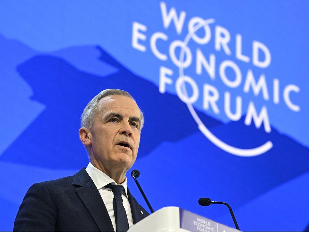 Canada's Prime Minister Mark Carney delivers a speech during the World Economic Forum (WEF) annual meeting in Davos on January 20, 2026. The World Economic Forum takes place in Davos from January 19 to January 23, 2026.