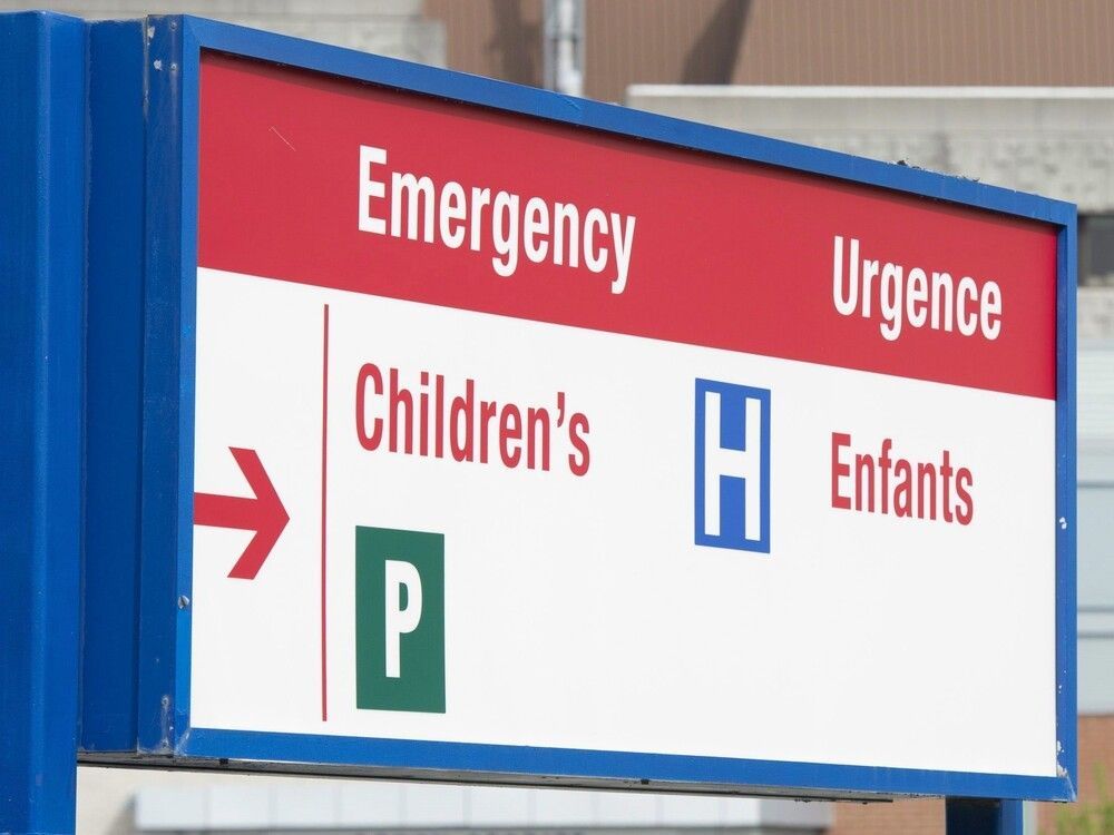 A file photo of a sign directing visitors to the emergency department at CHEO in Ottawa.