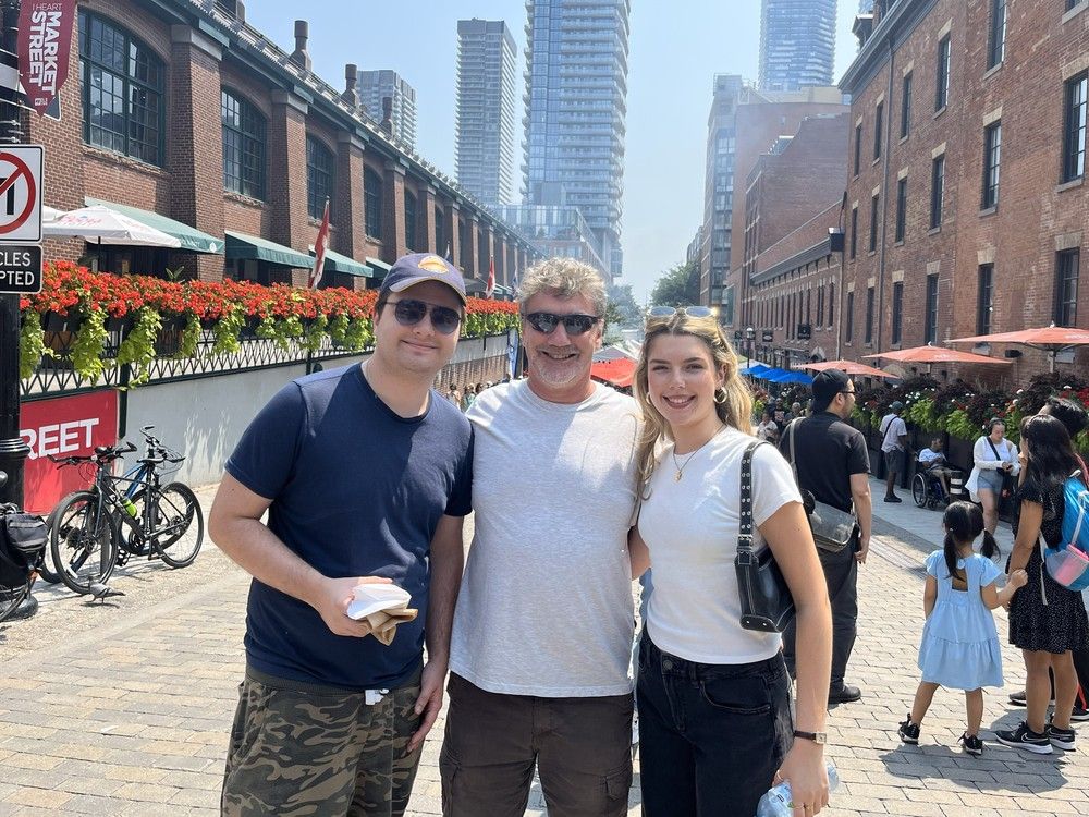  Ottawa man, Rejean Landry with his son Sebastien and daughter Emali decided to enjoy a forced layover in Toronto when their flight to Portugal was delayed. (Photo credit: Rejean Landry)