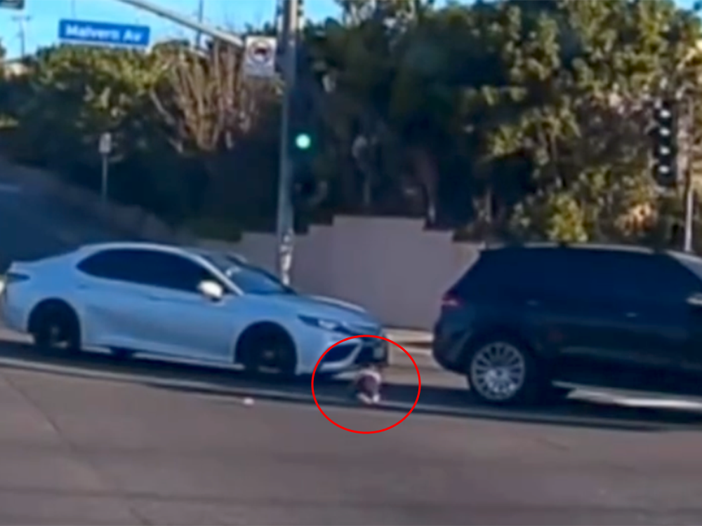 Dramatic video shows toddler falling from moving car in California intersection