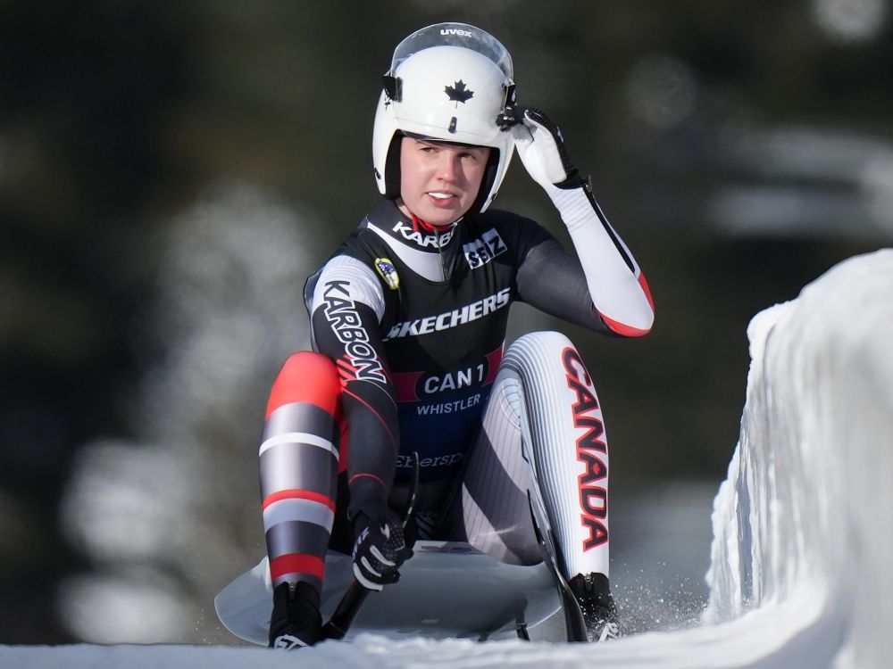 Canada's Trinity Ellis comes to a stop after her run while competing during the mixed singles event at the Luge World Championships last year.