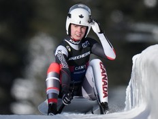 Canada's Trinity Ellis comes to a stop after her run while competing during the mixed singles event at the Luge World Championships last year.
