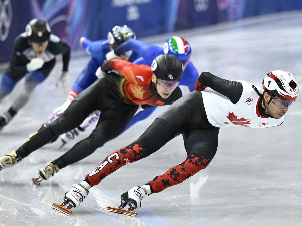 William Dandjinou takes Canada's first gold medal in short-track speedskating
