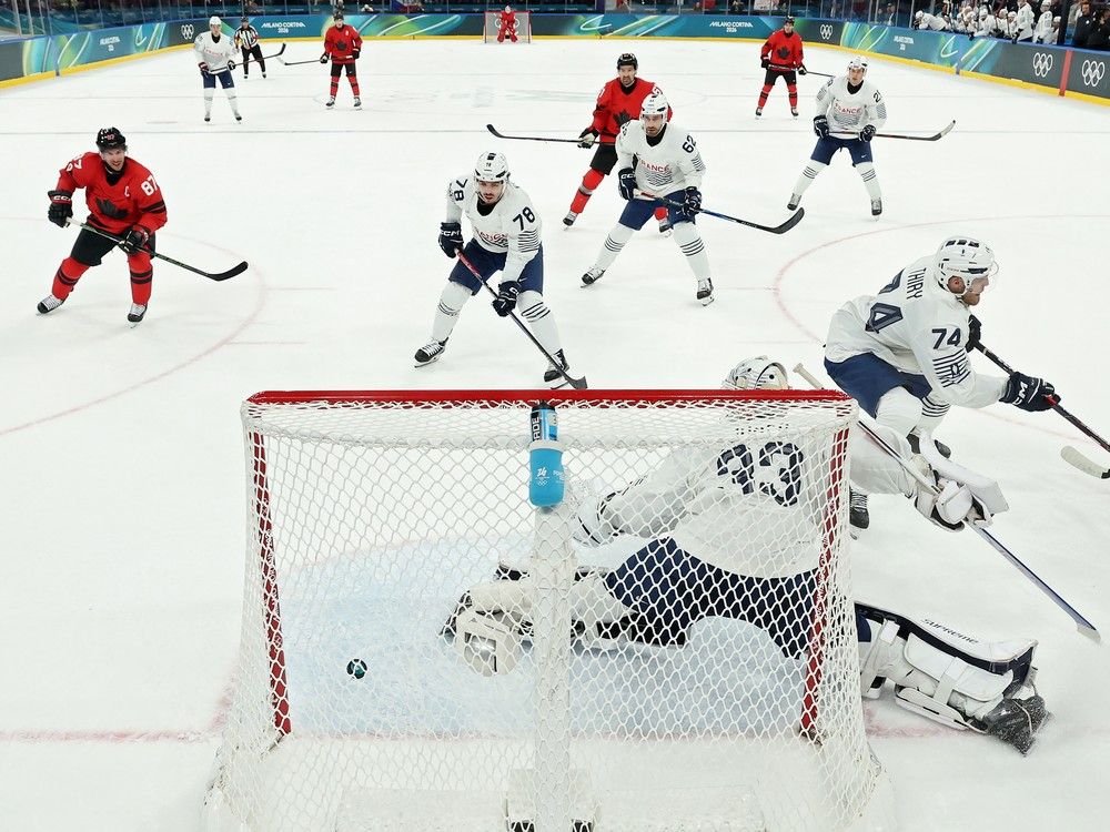 After big Team Canada win, classy Sidney Crosby gifts stick to French Olympic goalie on his birthday