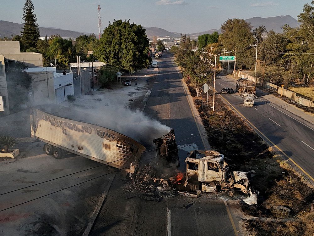 Mayhem after killing of cartel leader unlikely to end at Mexico's borders