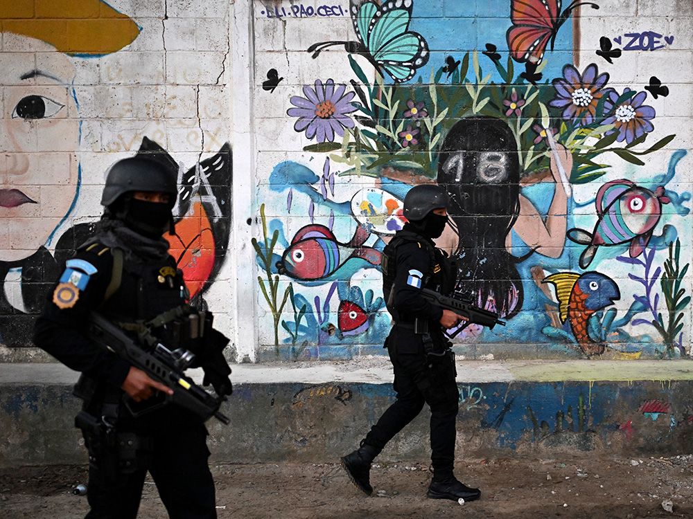 Police officers patrol following the inauguration of the Sentinel Plan which seeks to provide security in the metropolitan area to curb extortion and assaults and neutralize gang operations, in Guatemala City on Feb. 17, 2026. Police officers patrol following the inauguration of the Sentinel Plan which seeks to provide security in the metropolitan area to curb extortion and assaults and neutralize gang operations, in Guatemala City on Feb. 17, 2026.