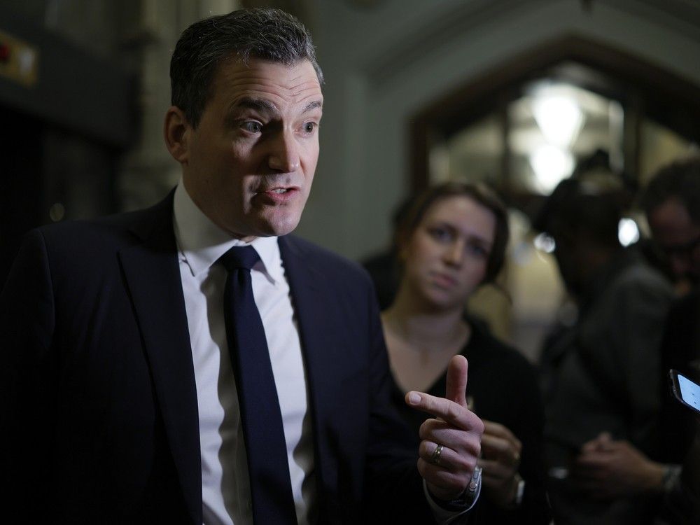Canada's Minister of Artificial Intelligence and Digital Innovation Evan Solomon speaks to journalists before a Cabinet meeting on Parliament Hill February 24, 2026.
